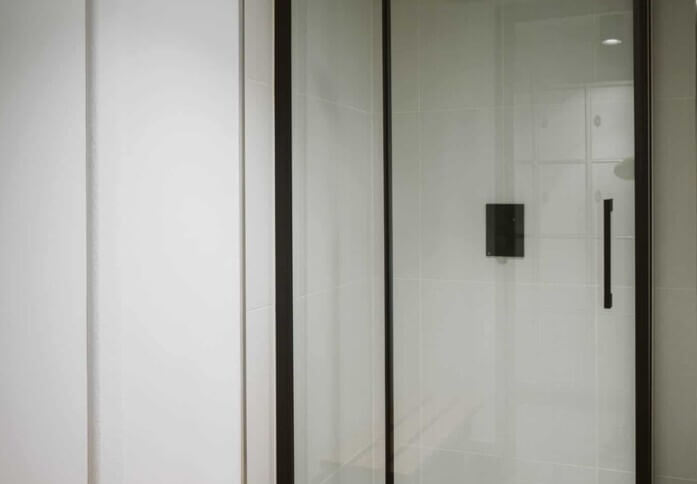 Showers in Settles Street, PG High Cross Ltd, Whitechapel