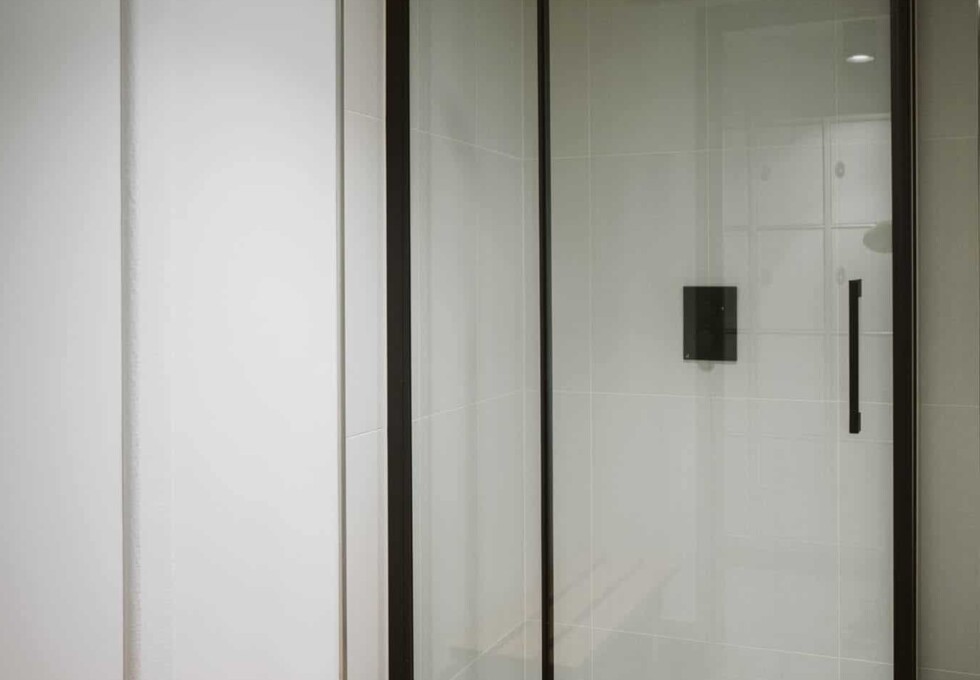 Showers in Settles Street, PG High Cross Ltd, Whitechapel