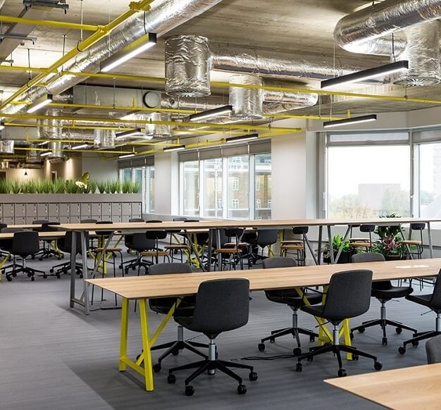 The shared deskspace at 3 Shortlands, Romulus Shortlands Limited in Hammersmith